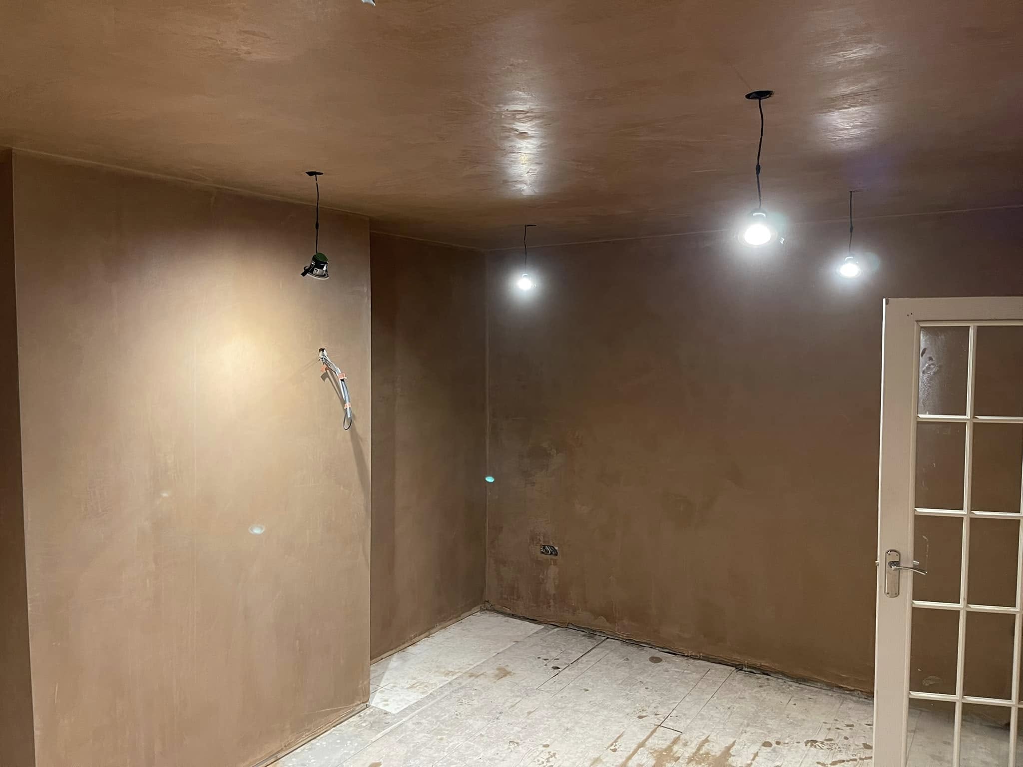 Rendering and plastering specialist work